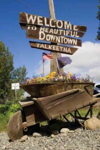 Community Signs: Mile Markers of Country Life Image